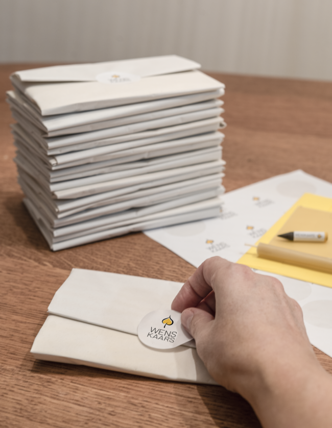 Wenskaars Stapel inpakproces